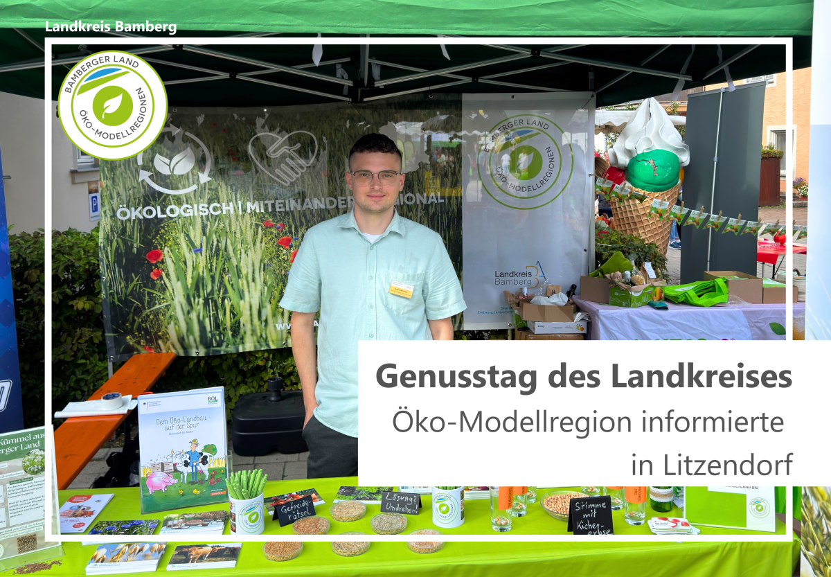 Infostand der Öko-Modellregion mit Personen