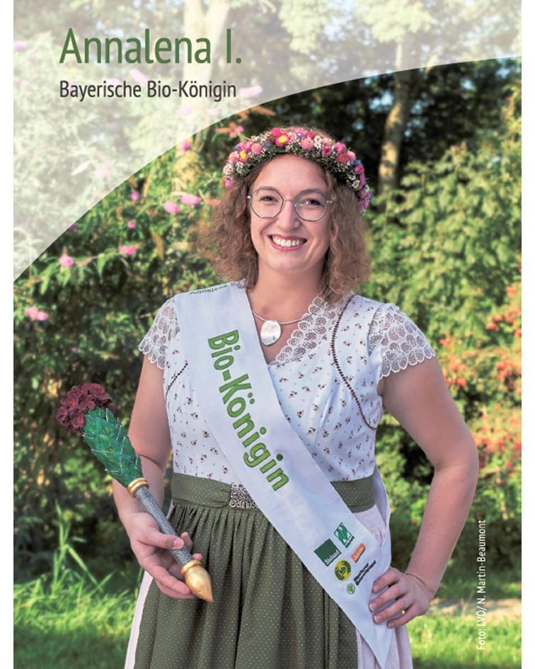 Frau mit Schärpe und Blütenkranz auf dem Kopf