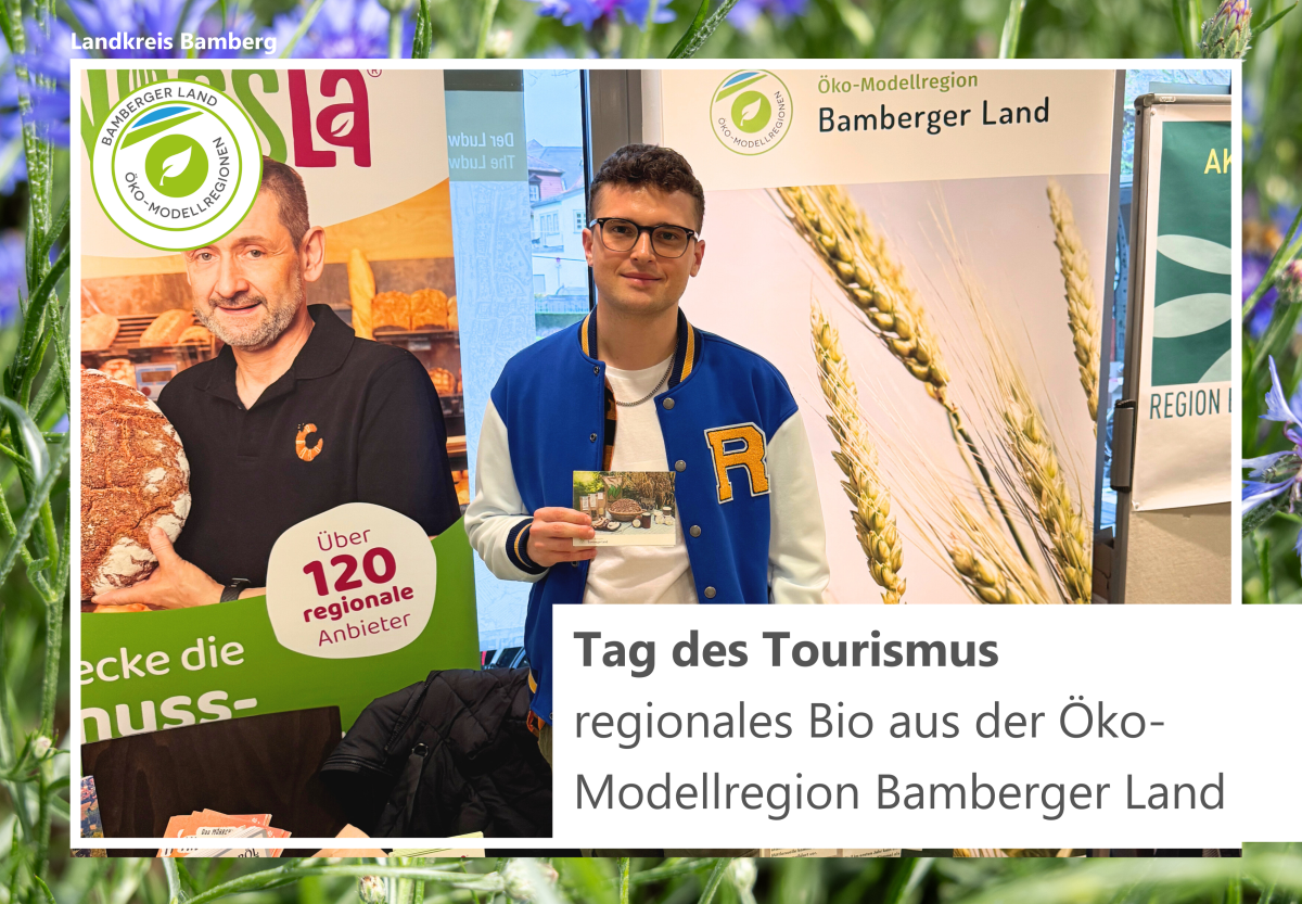 Infostand der Öko-Modellregion mit Personen